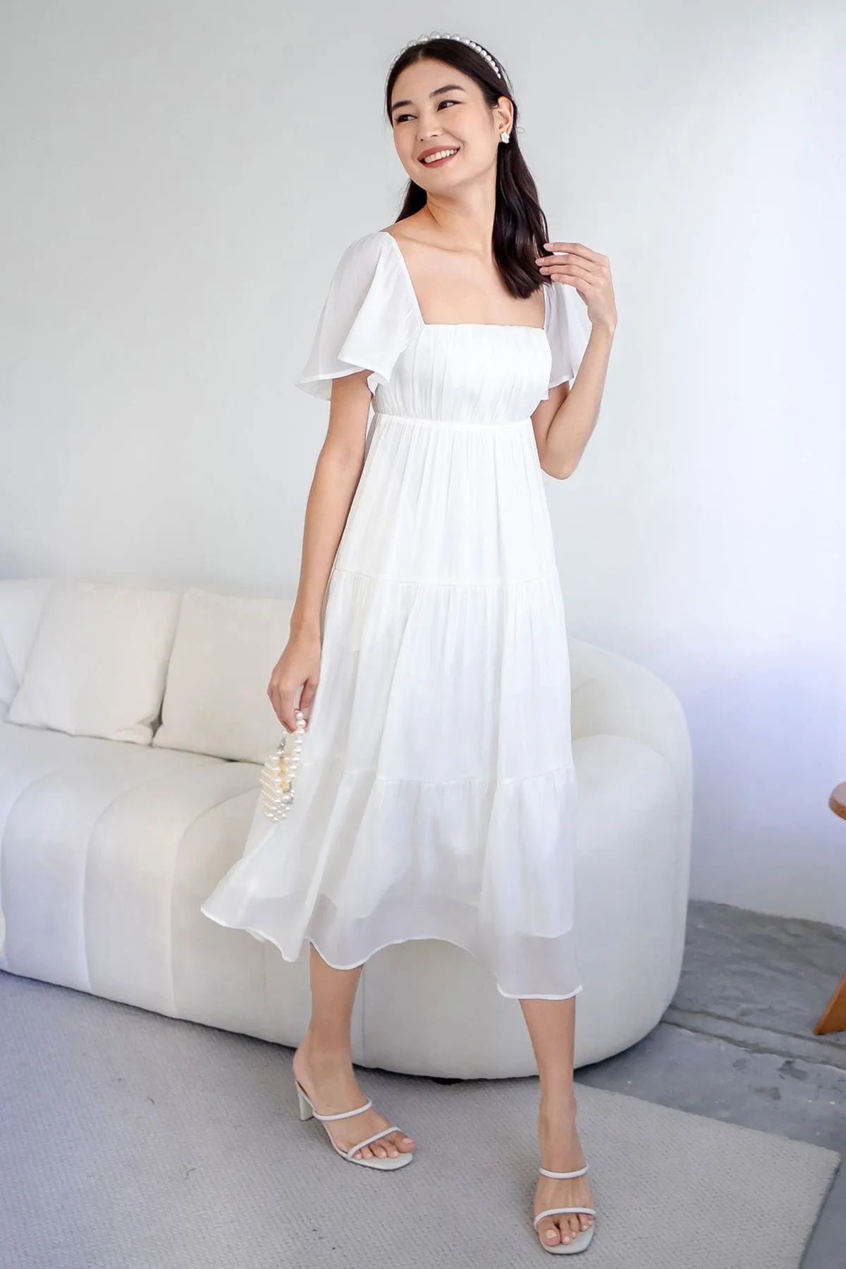 BELLE FLUTTERS SHIMMERY MIDAXI IN CREAMY WHITE