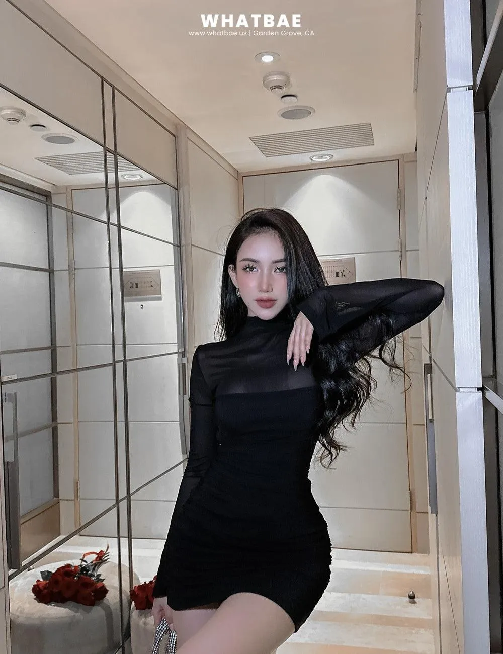 Long-sleeved short bodycon dress with a thin layer of chiffon on the outside